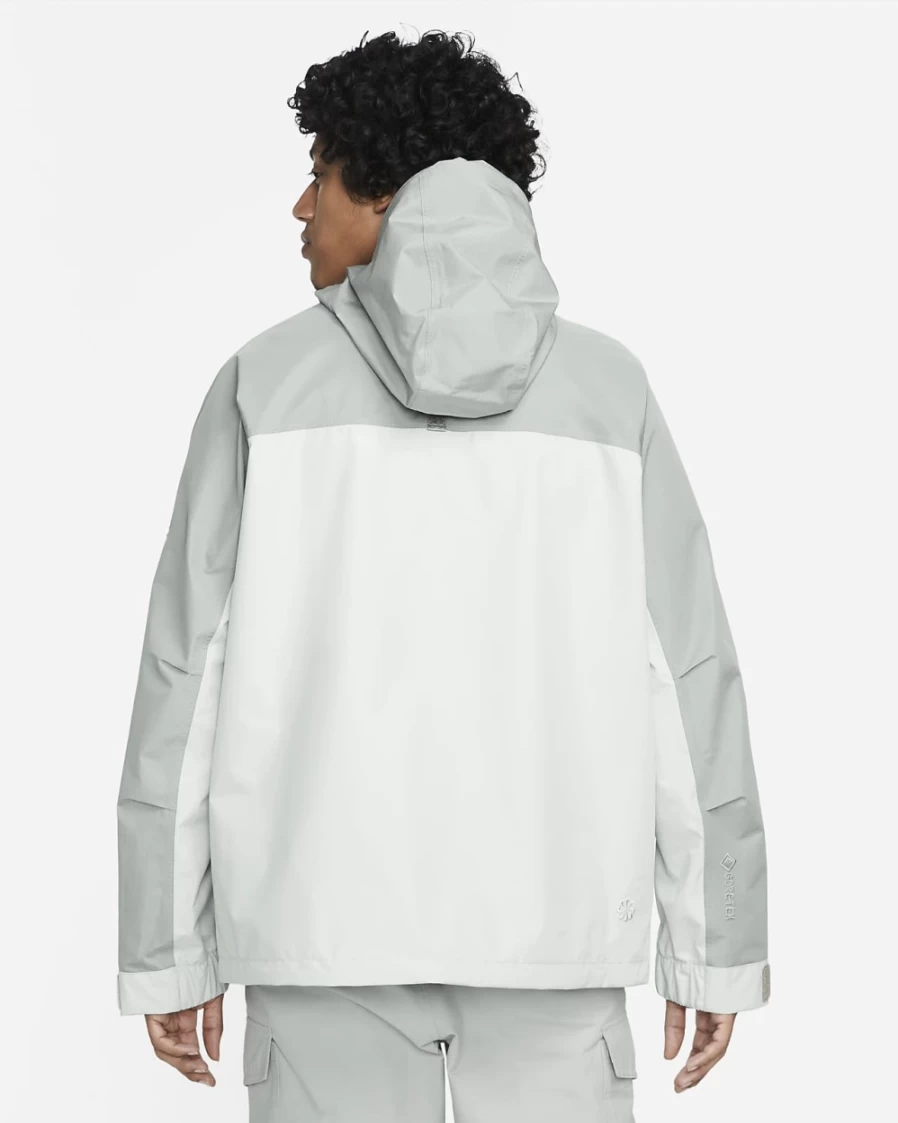 Nike Men's Storm-FIT ADV GORE-TEX Anorak Jacket in Mica Green & Light Silver | Waterproof Windbreaker