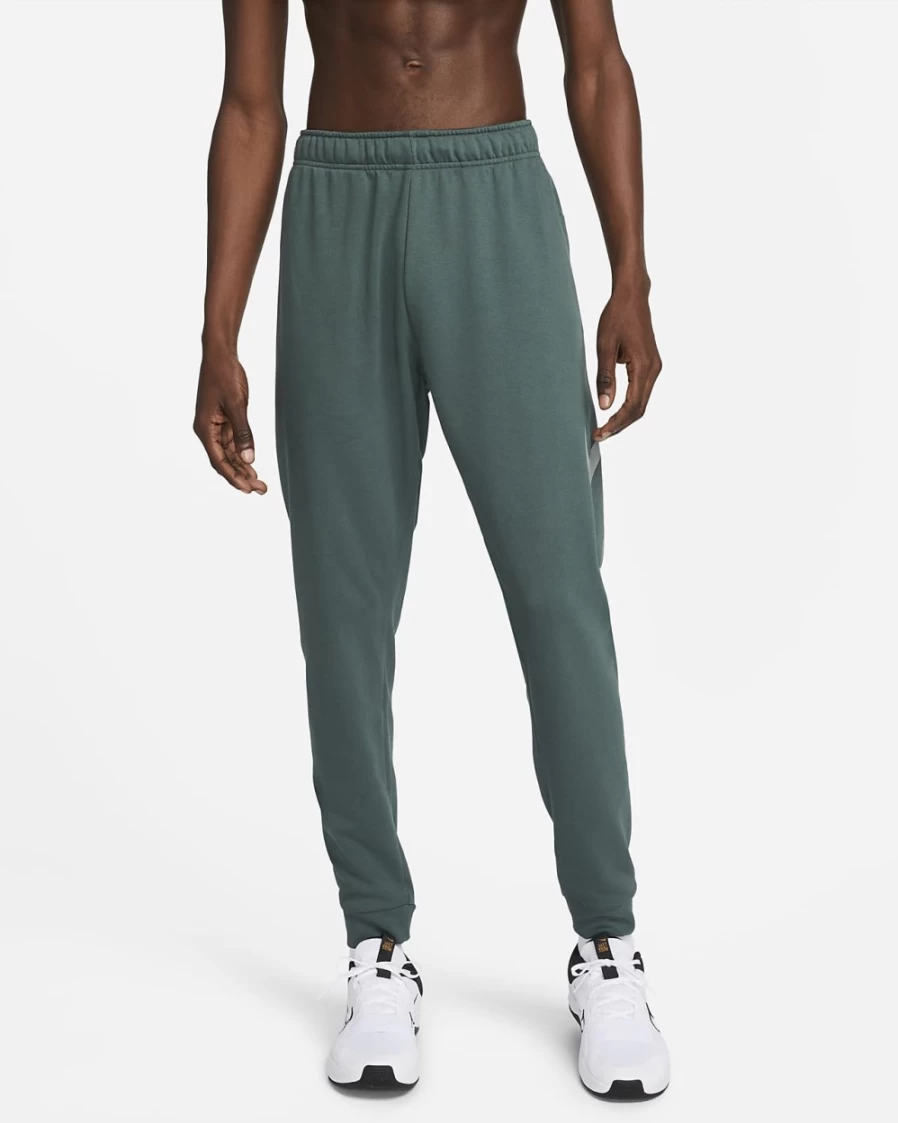 Nike Dri-FIT Men's Tapered Training Pants in Faded Spruce/Mica Green - Lightweight & Moisture-Wicking Workout Trousers